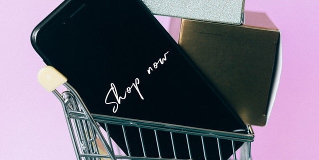 shop-now-words-on-mobile-phone
