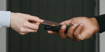 handing-over-credit-card