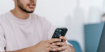 person-looking-at-cell-phone