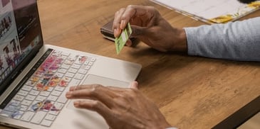 hands-holding-credit-card