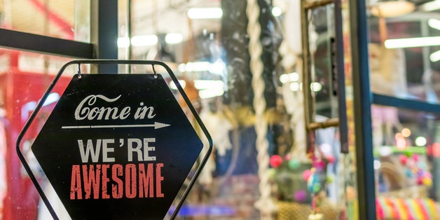 welcome-sign-in-front-of-store