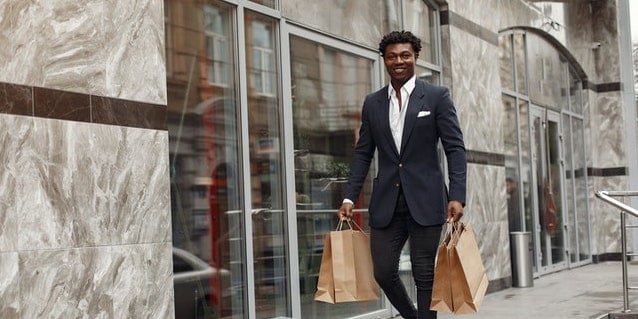 person-holding-shopping-bags