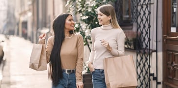 two-women-with-shopping-bags
