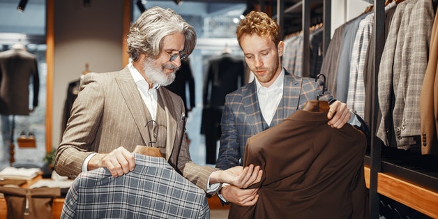 two-men-looking-at-suits