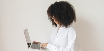 women-holding-laptop