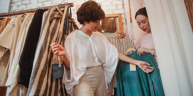 woman-trying-on-clothes