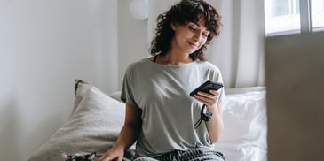 person-smiling-at-phone