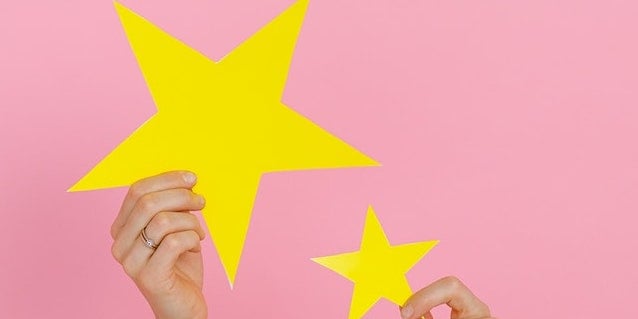 hands-holding-up-stars